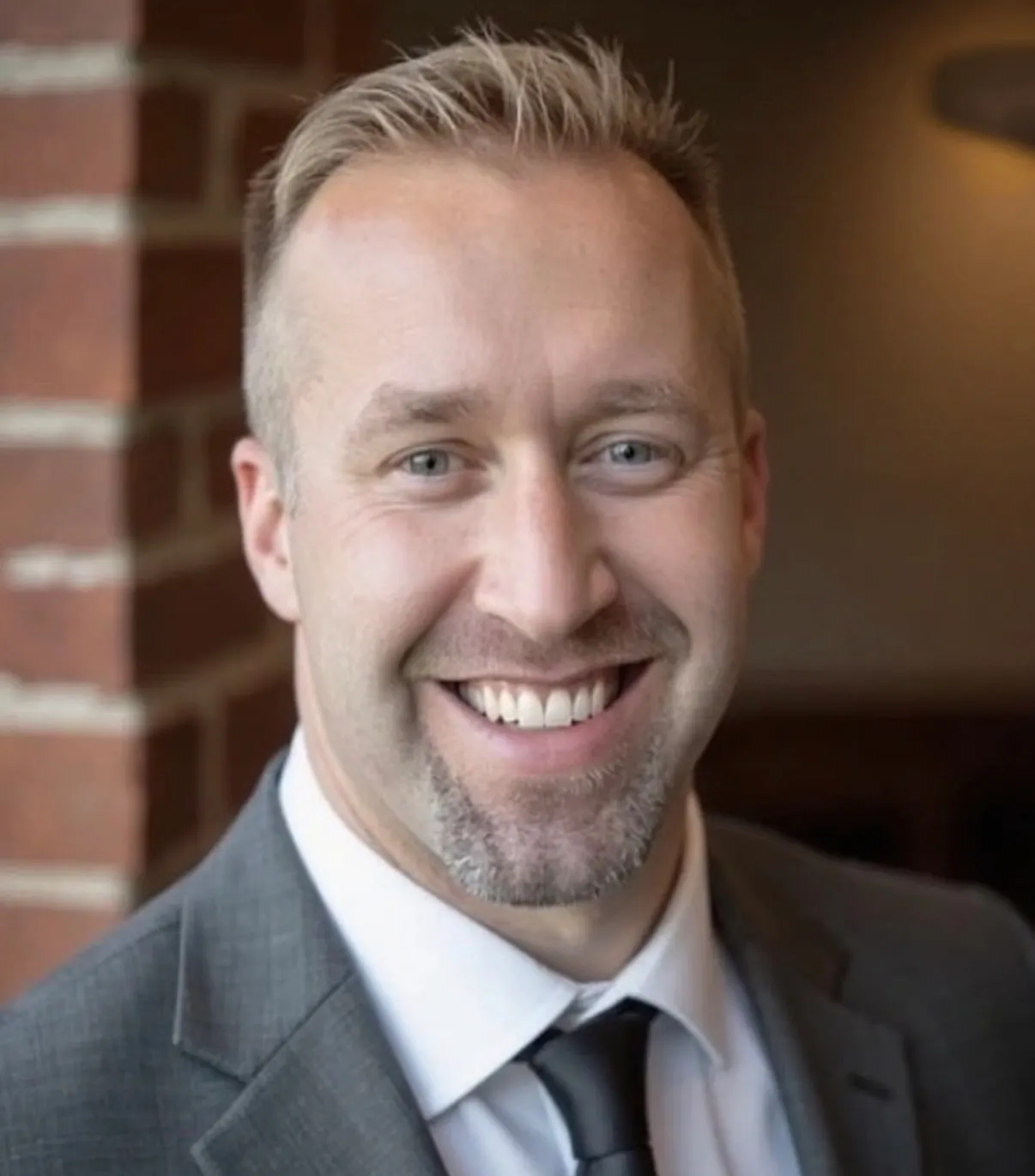 Headshot of Travis Riepenhoff.