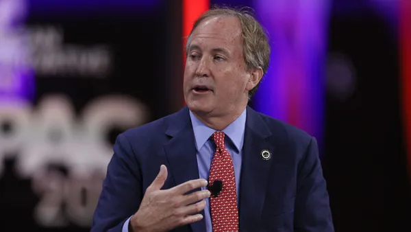 Texas Attorney General Ken Paxton speaks during a panel discussion at the Conservative Political Action Conference in February 2021.