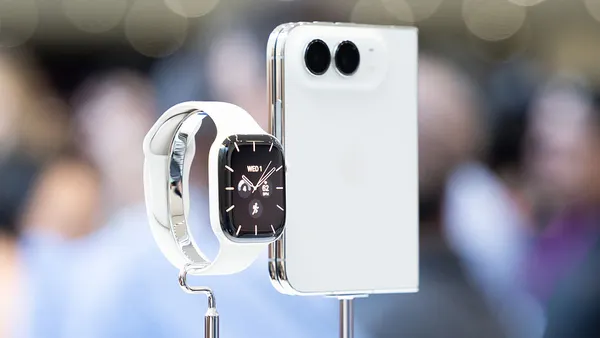 Two Apple products sitting stands