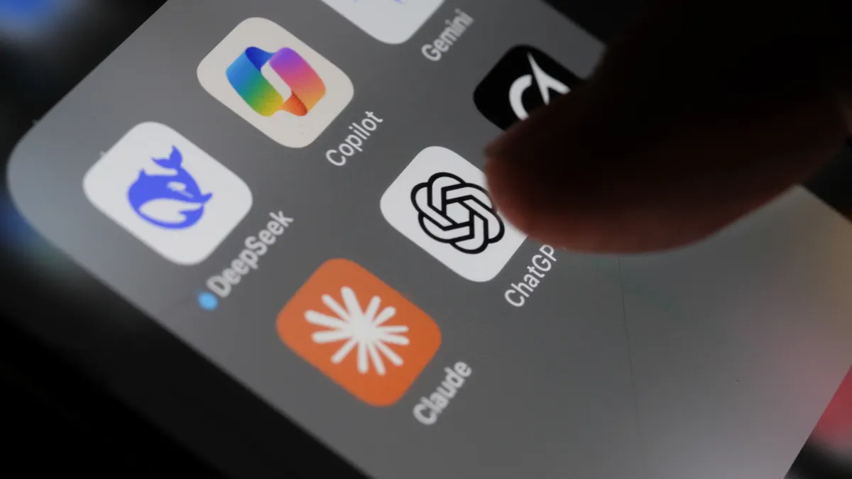 A customer presses the image of the ChatGPT app on their phone.