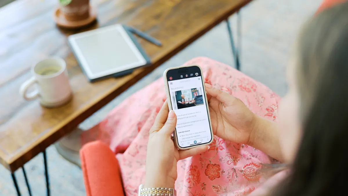 A person holding a mobile device