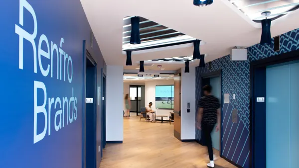 A person walks down a hallway at a Renfro Brands office