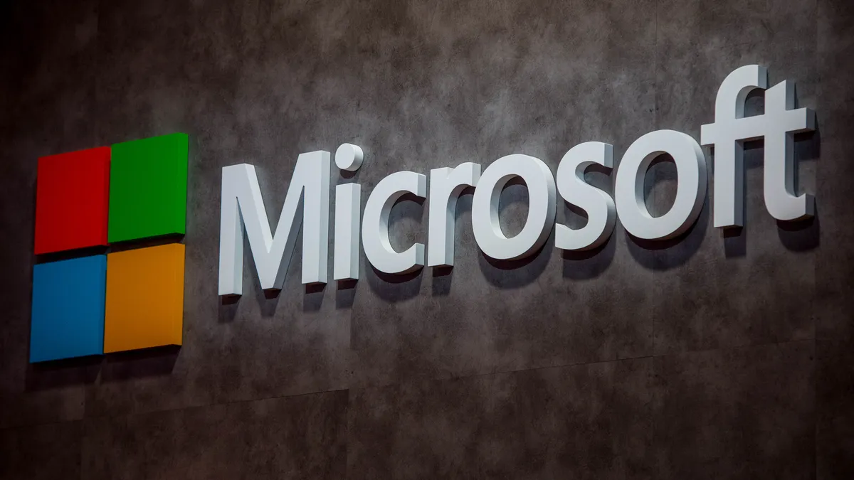 A logo sits illuminated outside the Microsoft pavilion on the opening day of the World Mobile Congress at the Fira Gran Via Complex on February 22, 2016 in Barcelona, Spain.