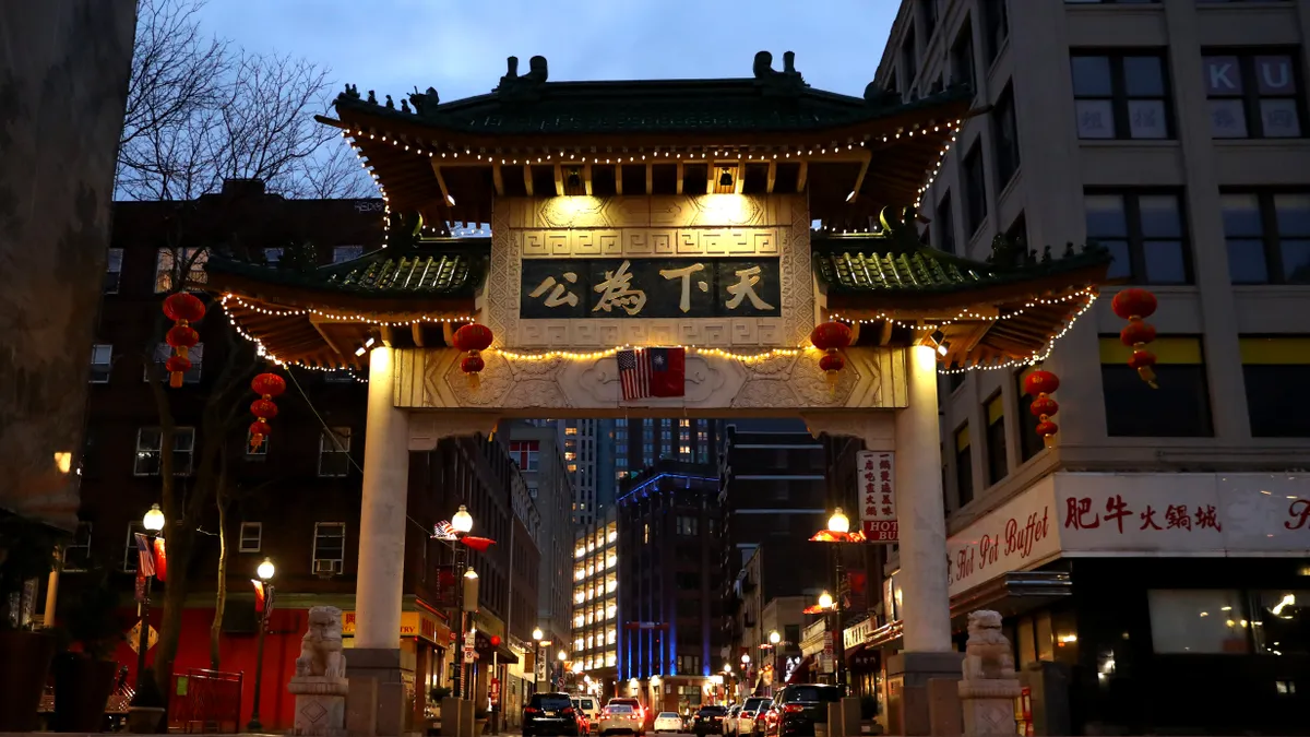 Nighttime view of Chinatown Gate in Boston.