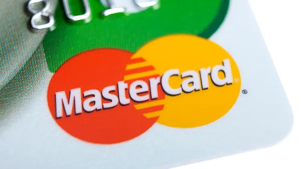A close-up of the red and yellow MasterCard logo.
