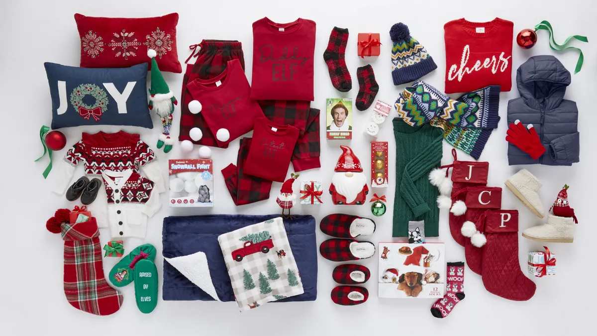 Gathering of holiday gift items including shirts, stockings, slippers and pillows.