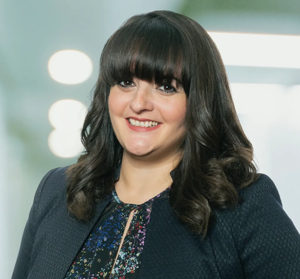 A headshot shows Elizabeth Coppolecchia, a partner with Miami-based law firm Weiss Serota Helfman Cole + Bierman.