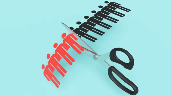 scissors chopping line of paper people in half
