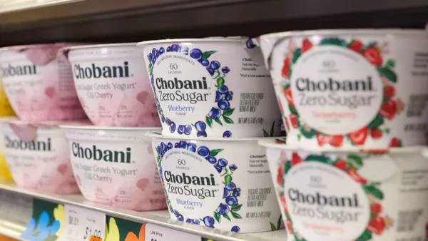 Single containers of Chobani Zero Sugar are on a store shelf.