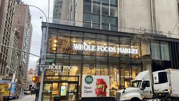 A chain grocery on a street corner.