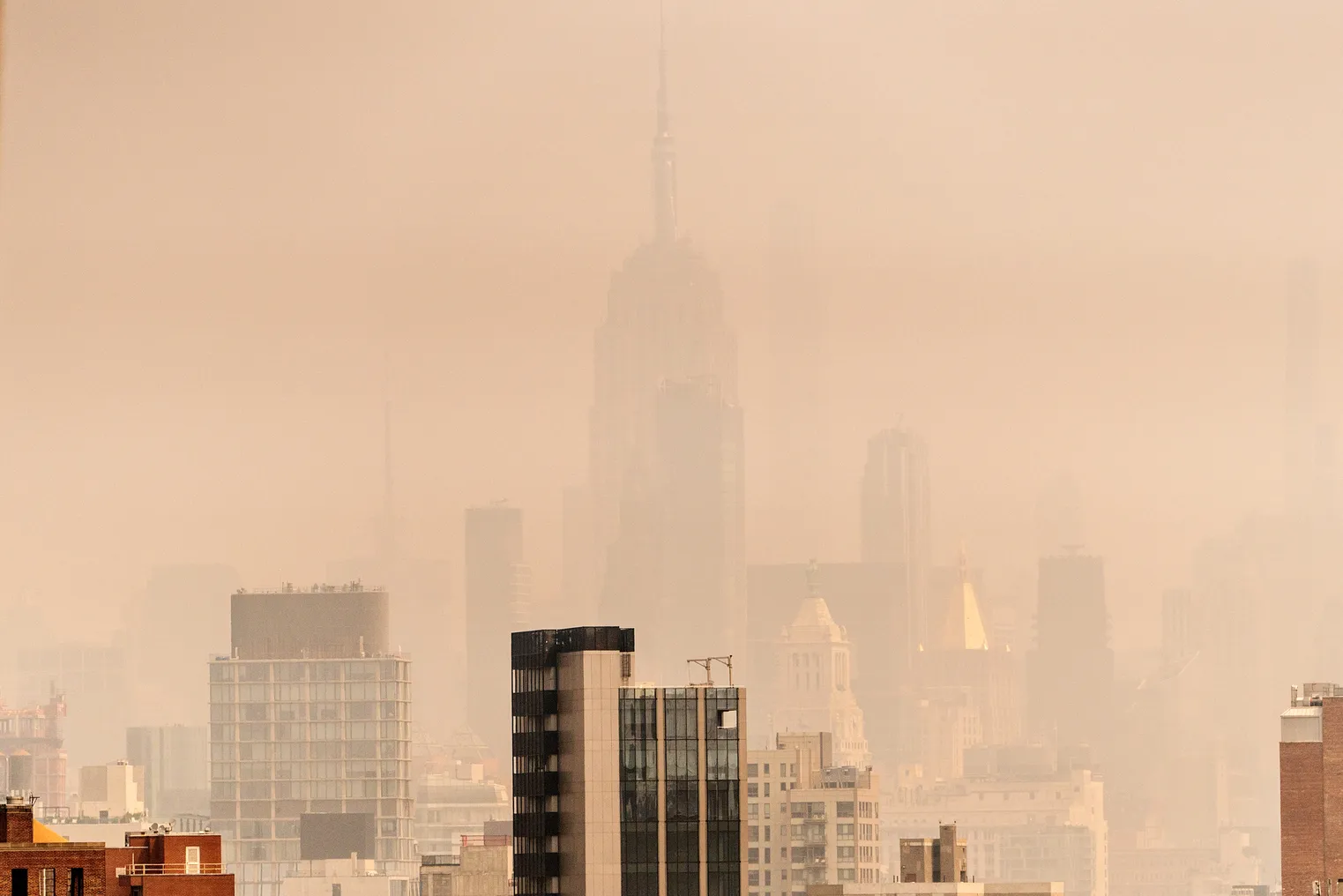 Smoke from Canadian wildfires creates hazy conditions over NYC