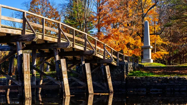 Old North Bridge over the Concord River in autumn in Concord, Massachusetts
