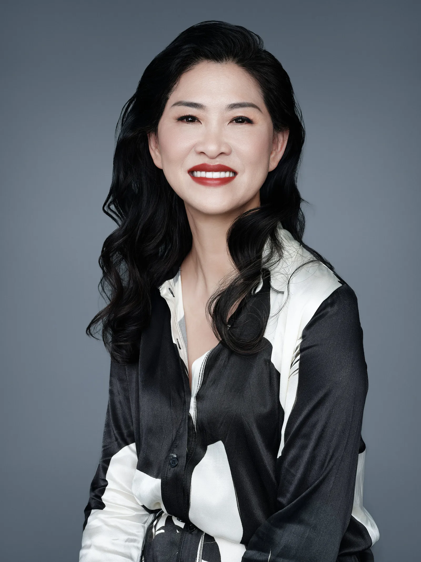 A headshot of Sephora executive Xia Ding.