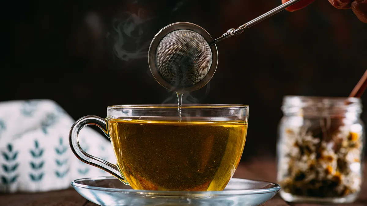 Chamomile Tea on Rustic Wooden Background