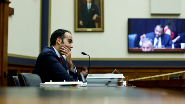 CFPB Director Rohit Chopra speaks in front of the House Financial Services Committee.