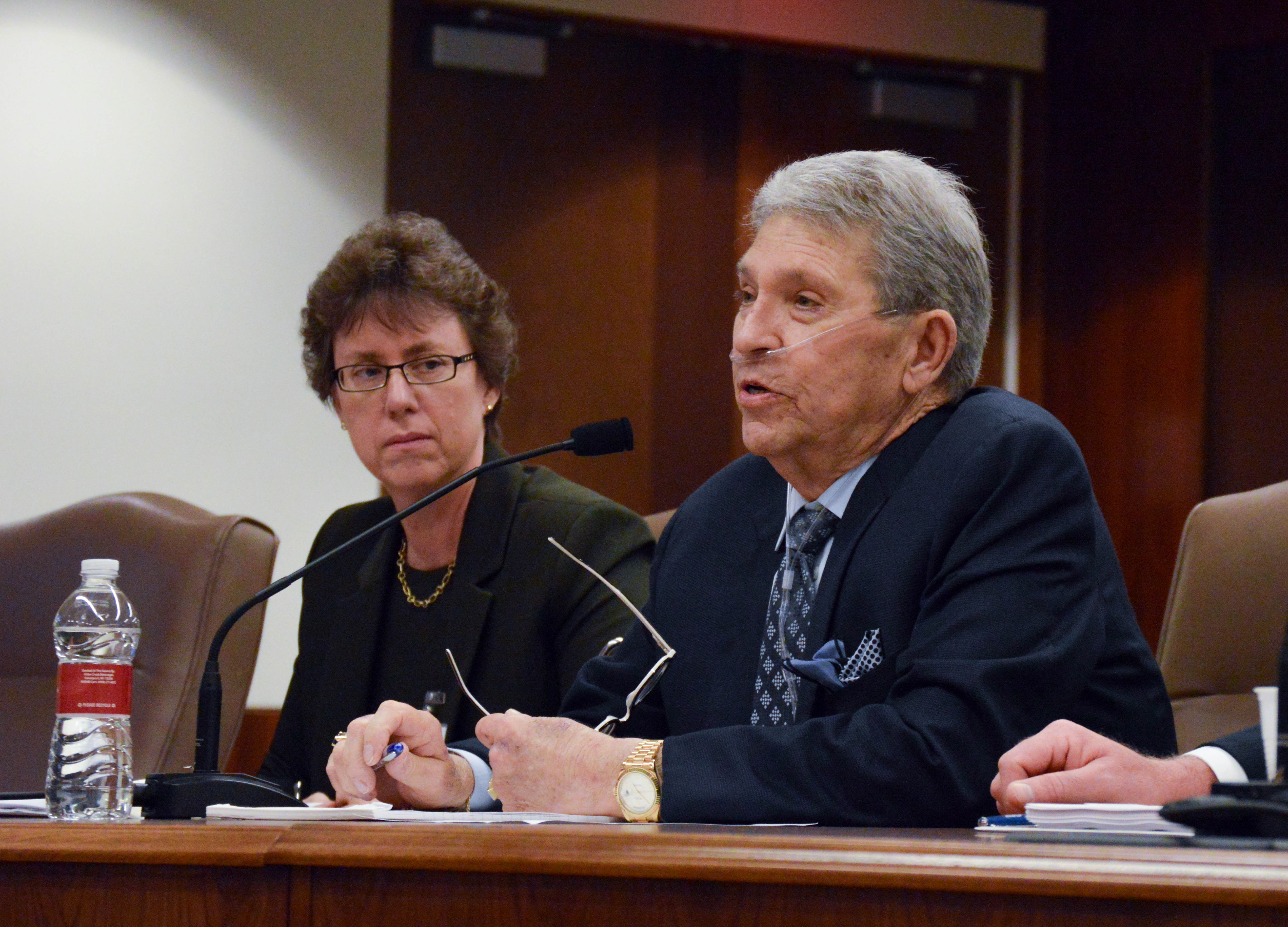 Cindy Sanborn (left) and the late Hunter Harrison (right) representing CSX at a Surface Transportation Board meeting.