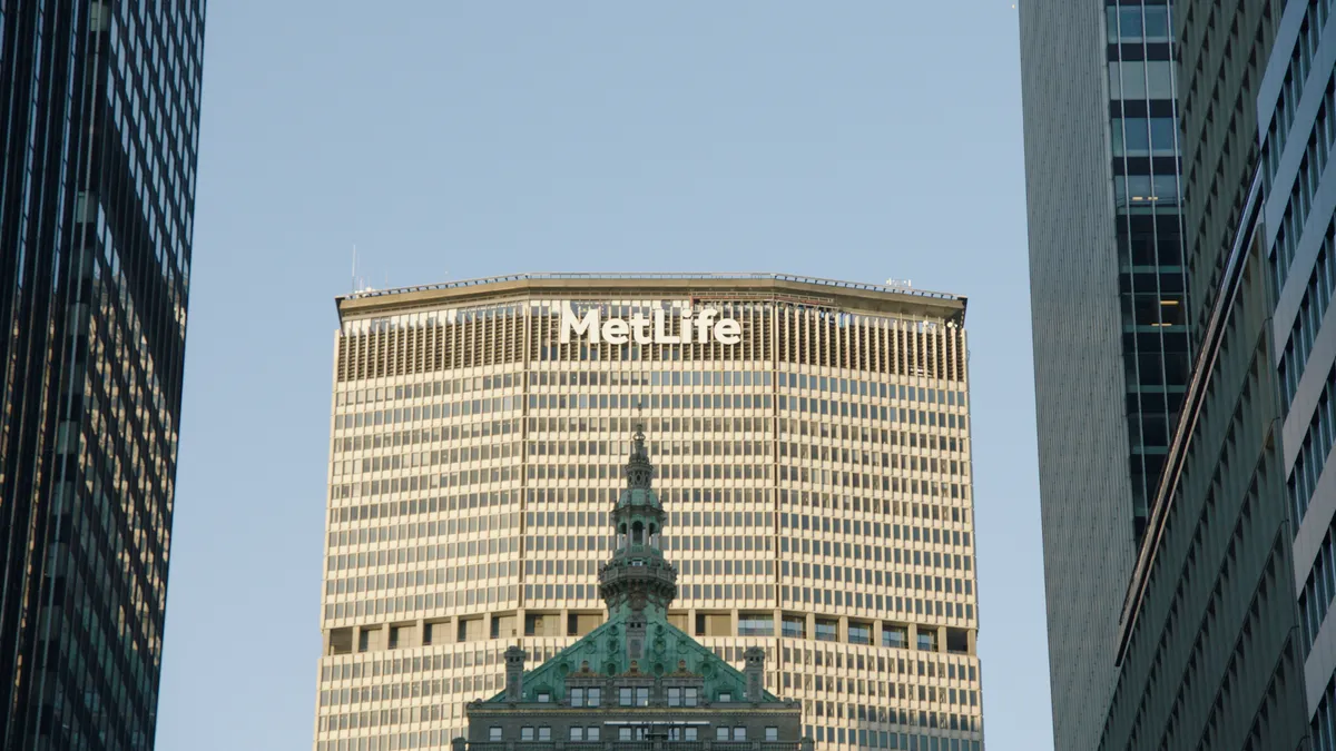 signage atop MetLife's headquarters in a skyscraper