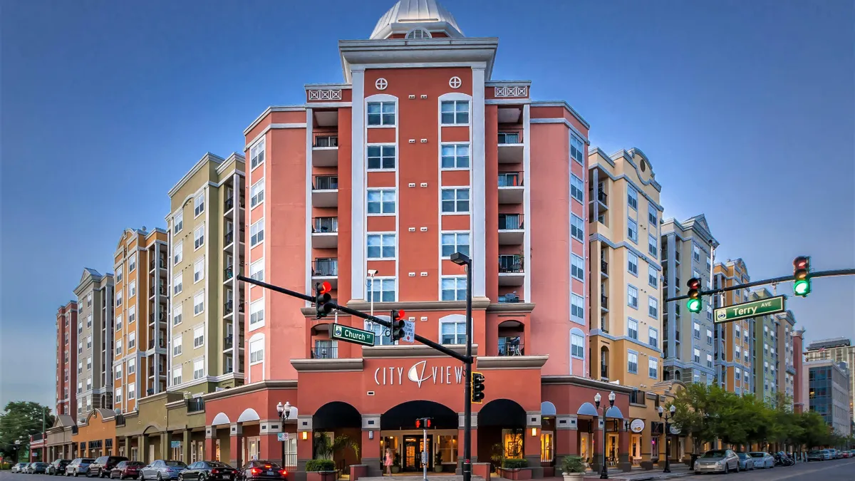 Brightly colored, mid-rise apartment building