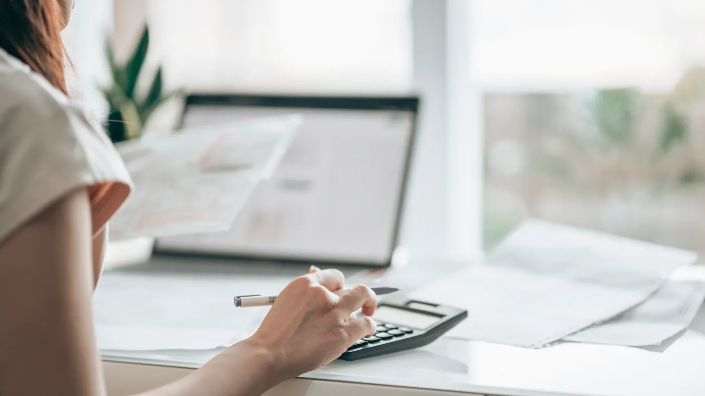 Business person handles accounting