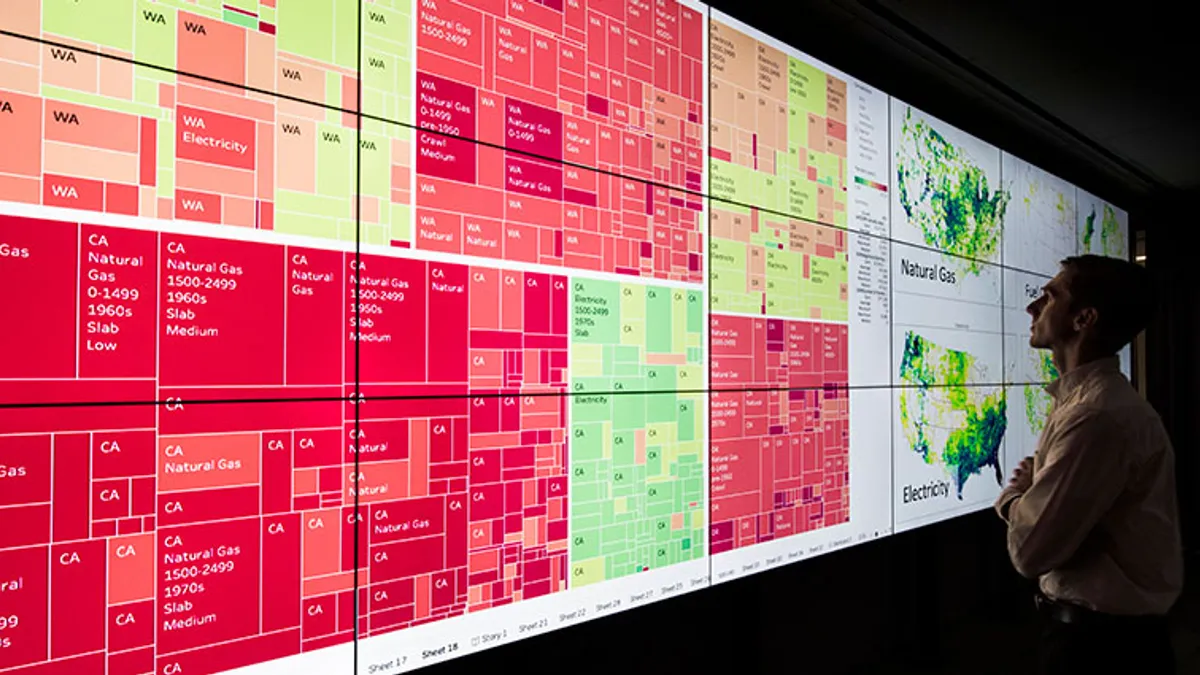 An investigator views building data in NREL's visualization lab.