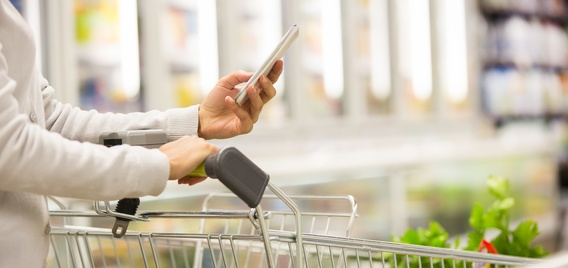 grocery shopper with smartphone