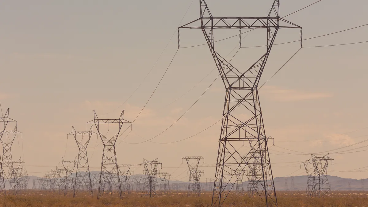 High voltage transmission lines in Nevada's desert.