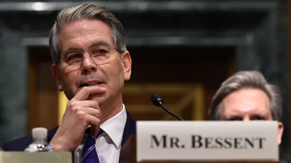 Scott Bessent testifies before the Senate Finance Committee.