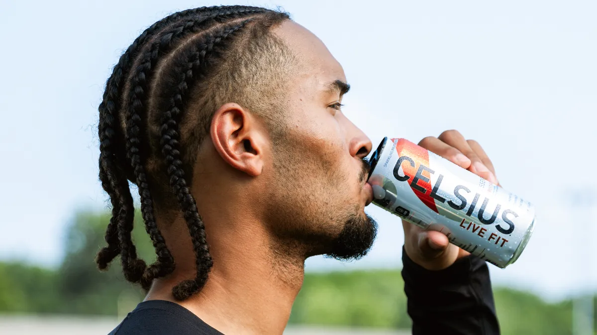 College football player Emeka Egbuka drinks a Celsius