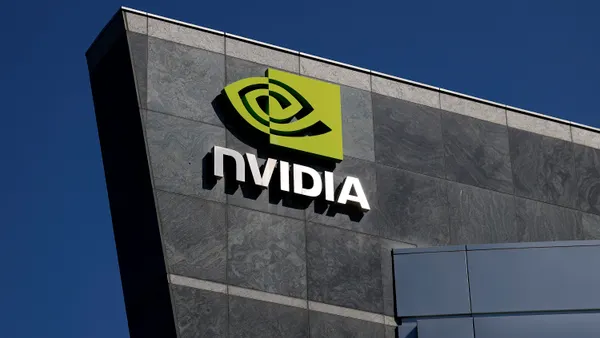 The Nvidia logo is displayed on a building at Nvidia headquarters on August 27, 2025 in Santa Clara, California.