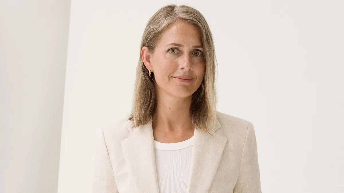 A professional headshot of Helena Helmersson