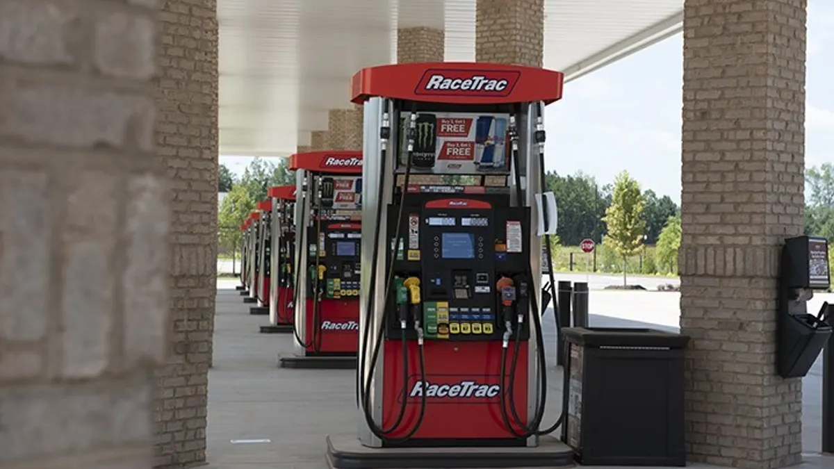 A photo of fuel pumps. The pumps read "RaceTrac."