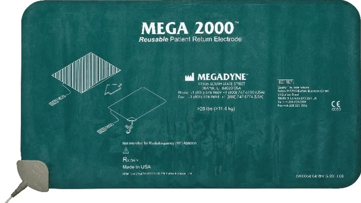 A green rectangular pad with the words "Mega 2000 Reusable Patient Return Electrode"