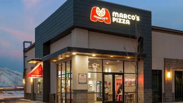 An evening image of Marco's Pizza