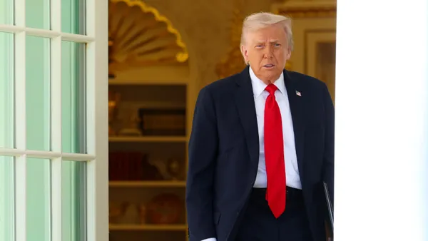 President Donald Trump walks to the Rose Garden of the White House on Oct. 21, 2025, in Washington, D.C.