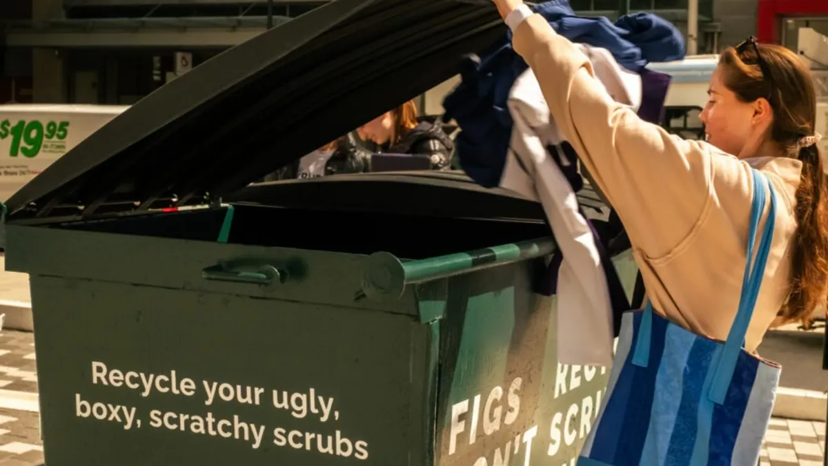 A person participating in Figs' in-person recycling pop-up