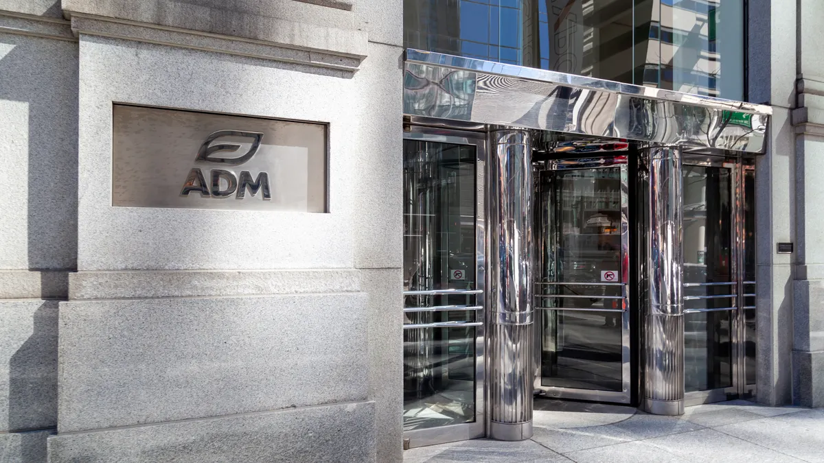 ADM logo displayed at the entrance to a building