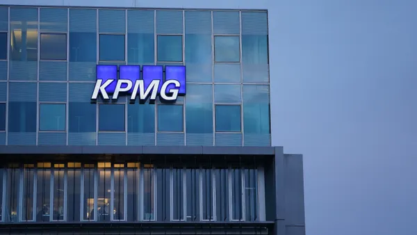 The KPMG logo on the facade of the professional services company's office building in Berlin on Jan. 22, 2021.