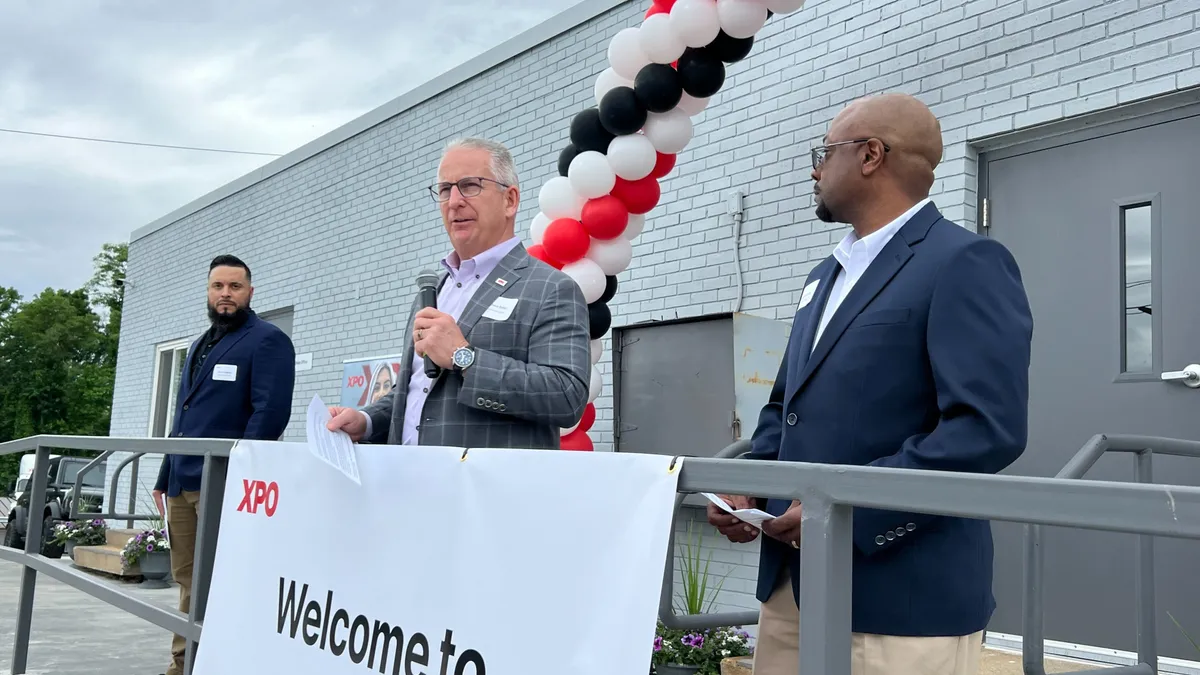 XPO COO Dave Bates speaks at the ribbon-cutting ceremony for the carrier's new terminal in Landover, Maryland.