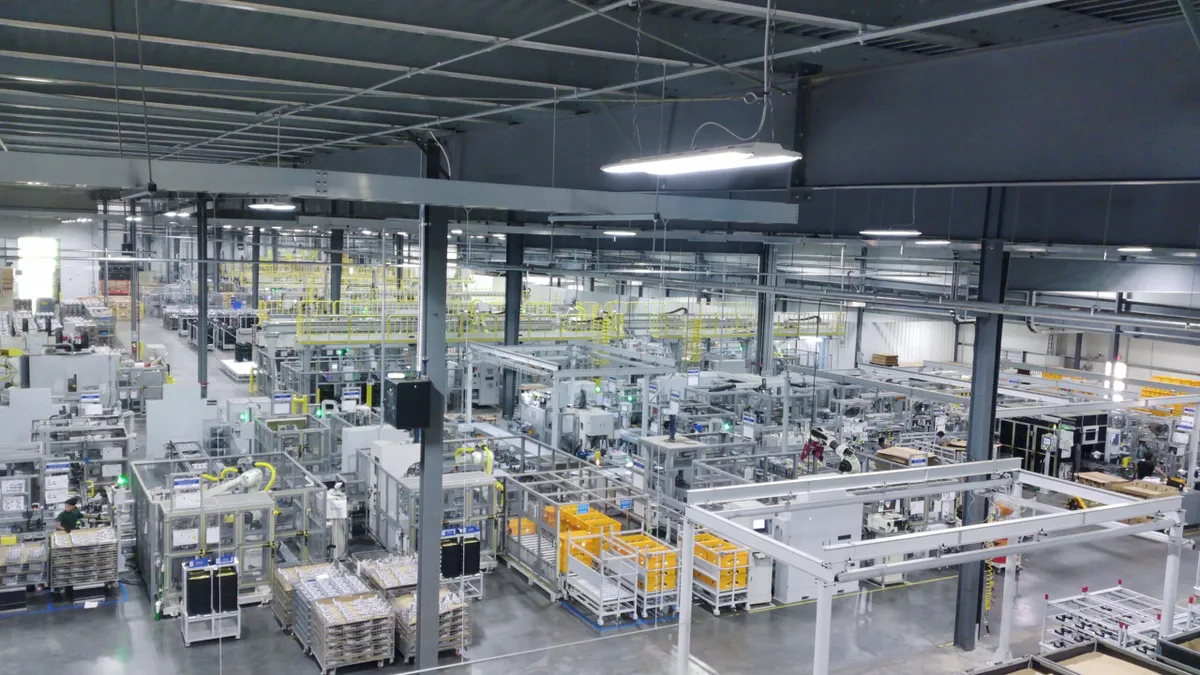 The white and gray interior of one of Shinhwa's manufacturing facilities in Auburn, Alabama.