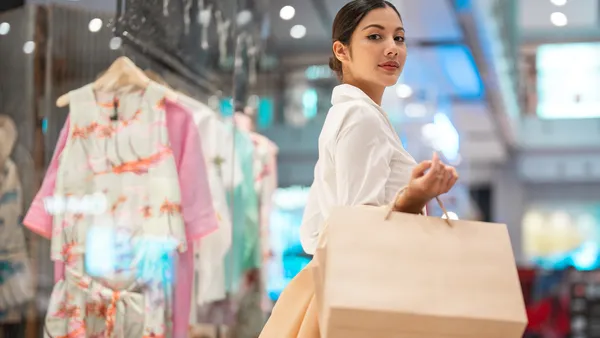 Lady with shopping bags in mall