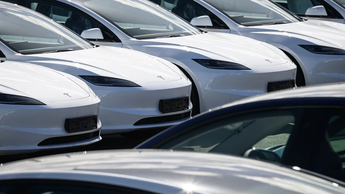 Tesla cars in a holding area in England