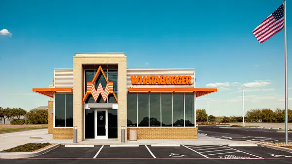 An orange and white fast food restaurant
