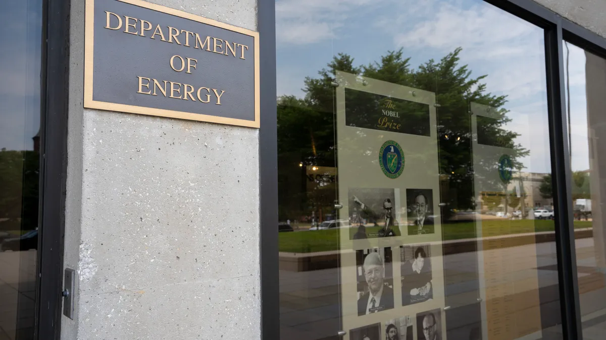 The Department of Energy (DOE) sign is seen at its headquarters, the James Forrestal Building, nicknamed the Little Pentagon, in Washington, DC.