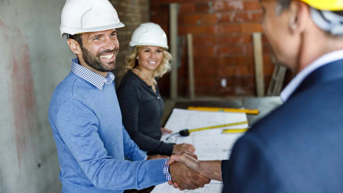 Couple came to an agreement with their architect at construction site