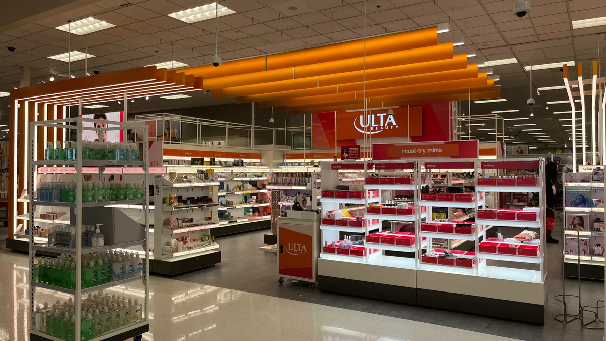 A series of beauty displays at an Ulta Beauty shop-in-shop inside of a Target.