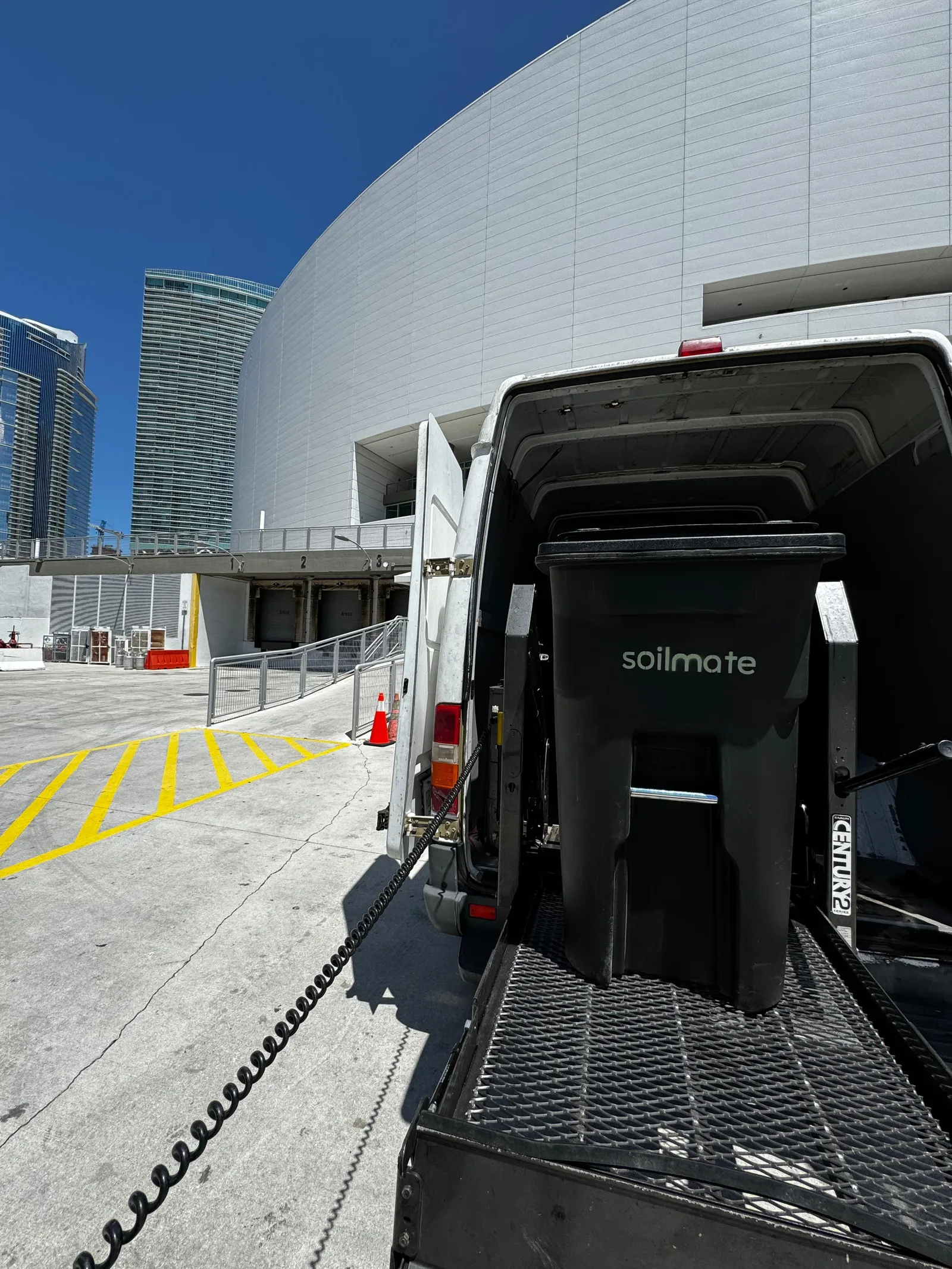 A Soilmate collection container on the back of a pickup vehicle in Florida