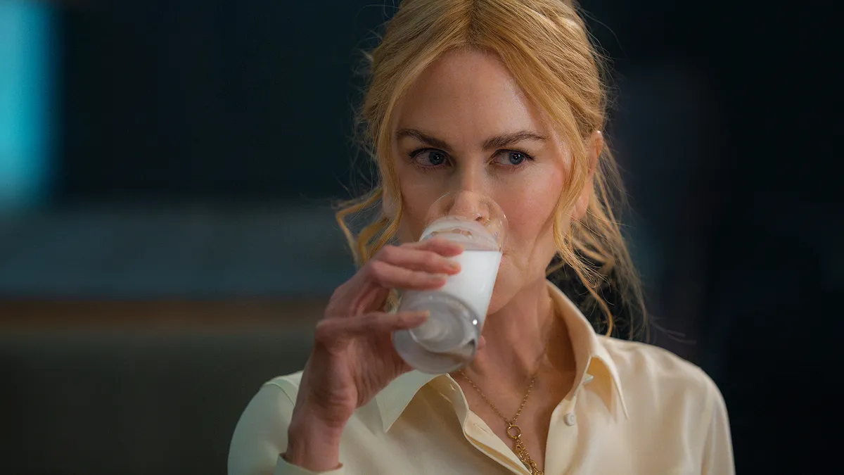 Nicole Kidman drinks milk in a scene for Babygirl.