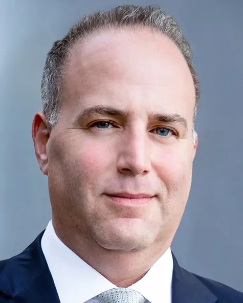 Picture of Noah Hochman chief investment officer at TruAmerica Multifamily.