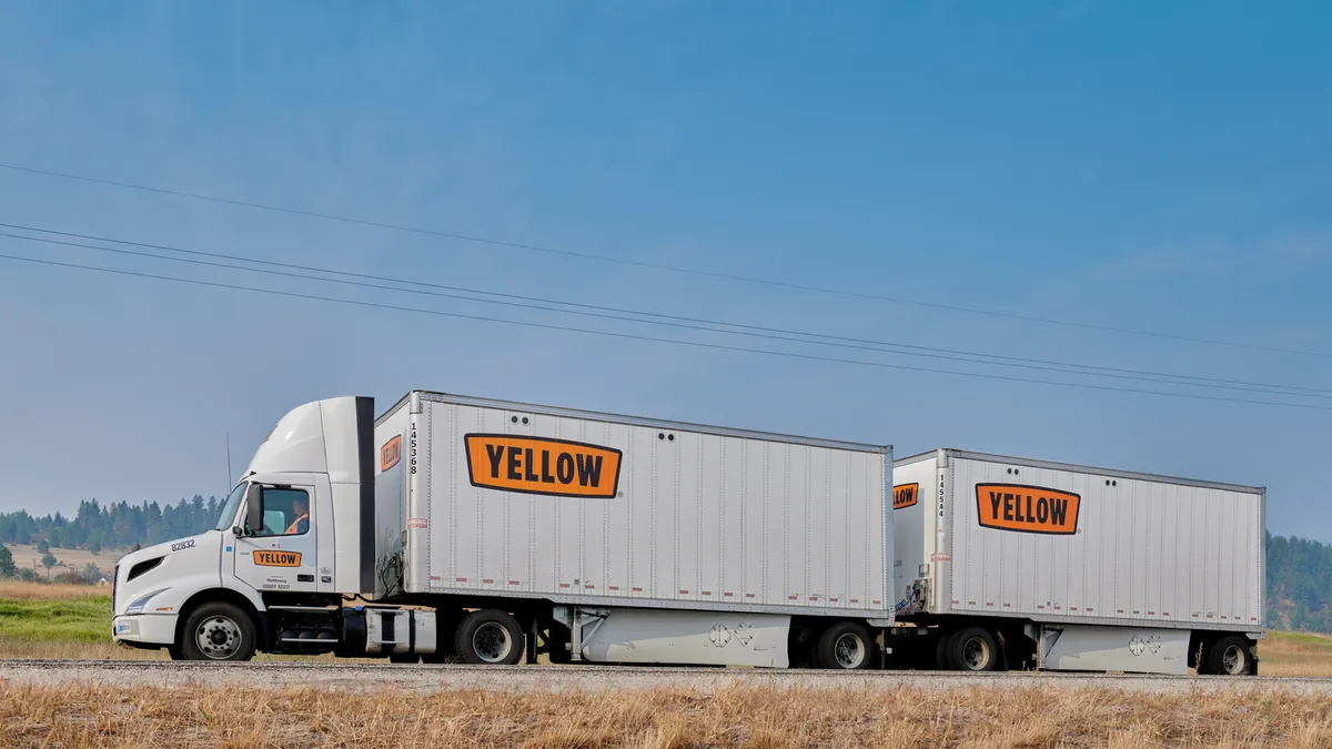 A Yellow Corp. truck on the road.