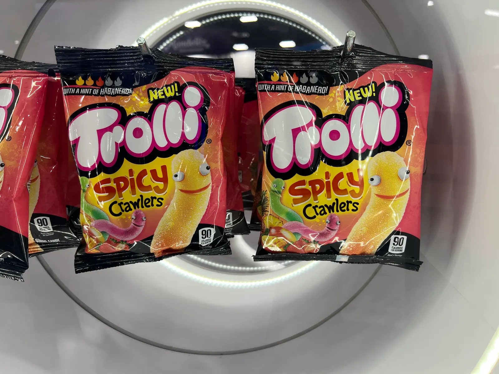 A display at the 2026 NACS Show showing Trolli's spicy gummy candies